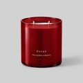 Rouge 400g candle with two cotton wicks on a neutral grey background